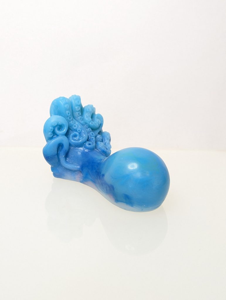 ruby glow rides Dreams -  a silicone tentacle grinder in blue