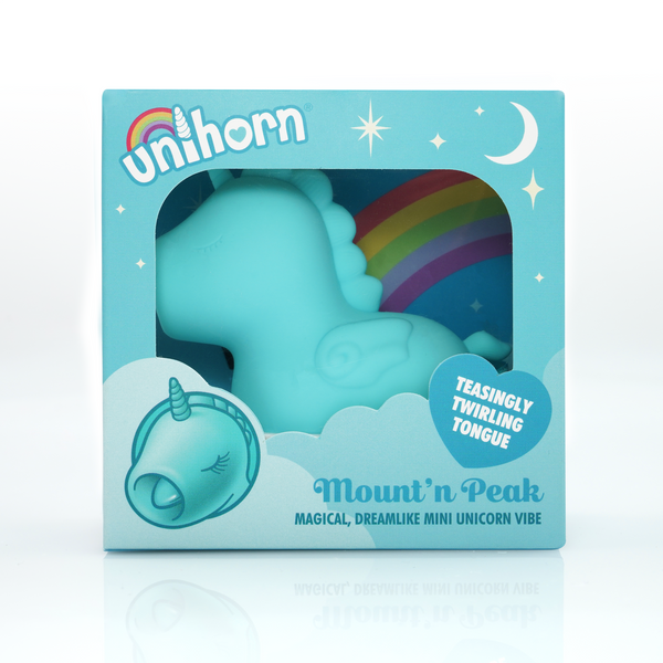 a little blue toy in a box - the Unihorn looks like a carebear box or my little pony